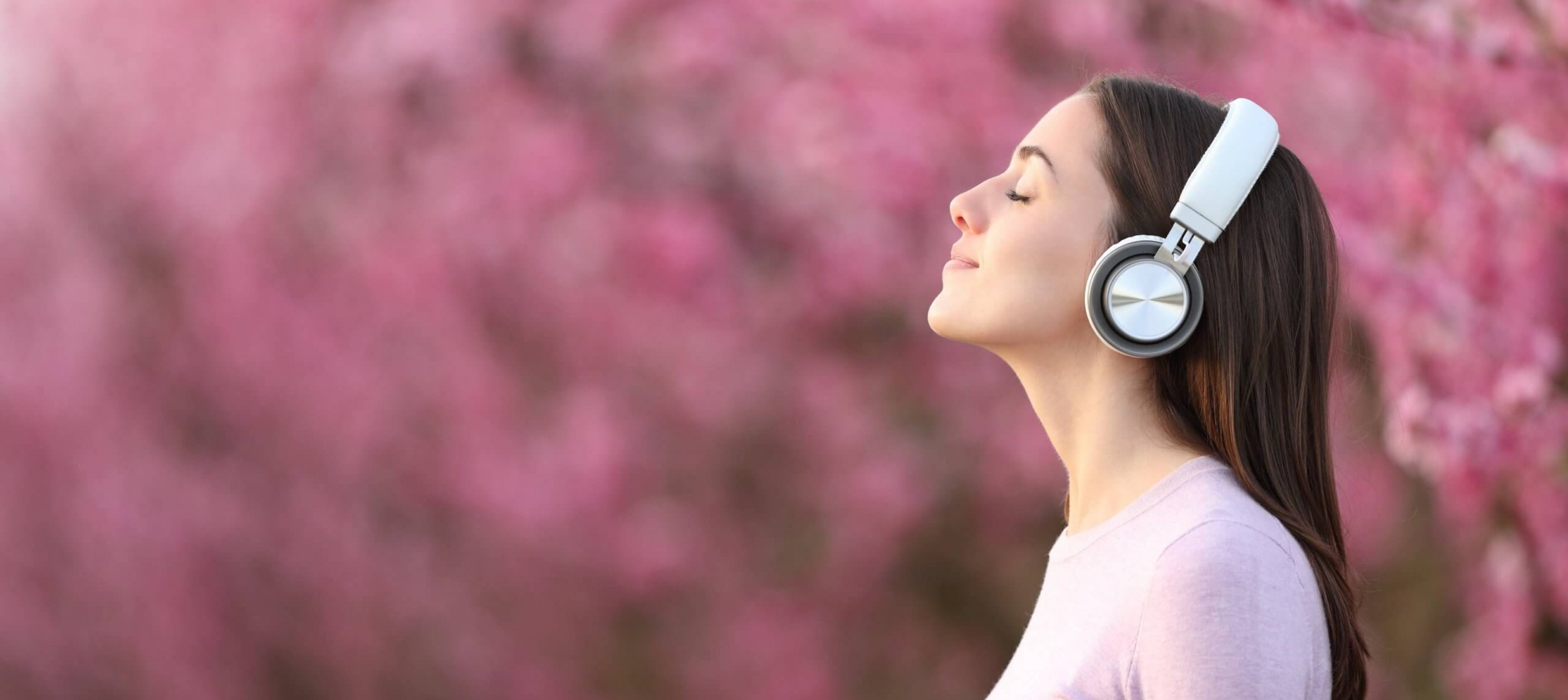 Side,View,Portrait,Of,A,Woman,Relaxing,Listening,To,Music